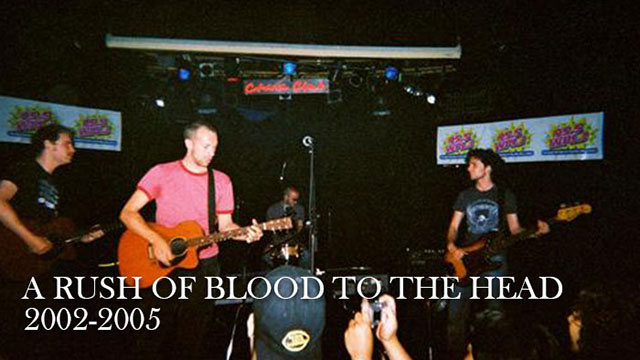 A picture of the band playin live in 2003