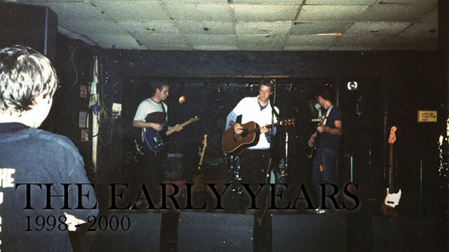 A photo of the band in July 1999